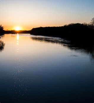 the Wabash River surrounded by trees
